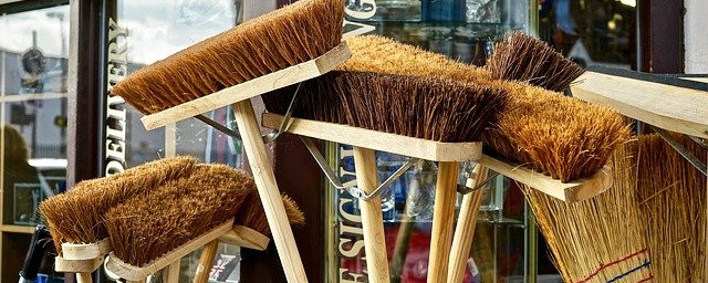 A whole bunch of brooms A whole bunch of brooms outside a shop window