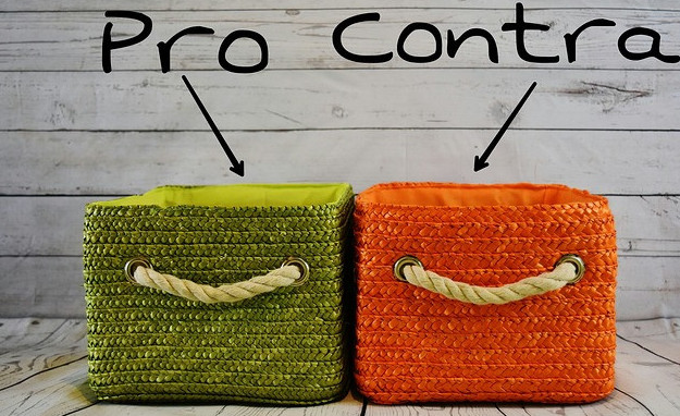 Pro and Con sign pointing to two pro and con baskets